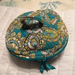 Vera Bradley cosmetic bag, machine washable. Individual side pockets